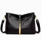 The Jacē Scarlet Tassel Hobo